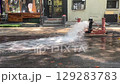 Splashing water from a NY fire hydrant 129283783