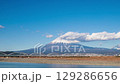 Timelapse clouds rolling over Mount Fuji and the Fujikawa bridge, Shizuoka, Japan  129286656