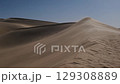 Sand dunes in desert 129308889