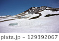 Mount Asahi in the Daisetsuzan Mountains in May, with remaining snow and fumarole (Hokkaido) 129392067