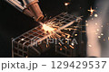 Laser welding machine. Shot on super slow motion camera 1000 fps. Laser welding is shown in close-up 129429537