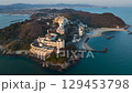 4K drone footage of the evening view of Nishiura Onsen, a famous hot spring resort on the peninsula in Gamagori, Aichi Prefecture 129453798