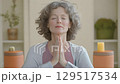 Woman practicing lip massage in indoor environment 129517534
