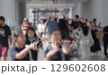Busy Crowd of Unrecognizable Pedestrians in a Public Space 129602608