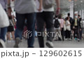 Crowded Urban Transit Hub with People Walking and Interacting in Modern Environment 129602615