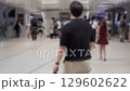 Blurred Motion of Unrecognizable People in a Busy Subway Station 129602622