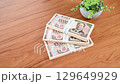 Image of a stack of Japanese banknotes 129649929