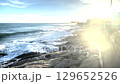 Scenery of waves crashing on the beach (Enoshima, Japan) 129652526