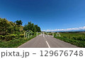 Drive along the "Roller Coaster Road" that stretches straight through Biei 129676748