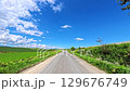 "Biei Hills" Drive along a gently curving road under the blue sky 129676749