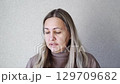 Young caucasian female speaking and expressing emotion in closeup sequence 129709682