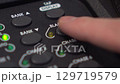 Man deactivates Blackout on lighting console - button stops blinking, close-up in 4K 129719579
