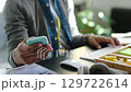 Creative programmer hands on social media phone 5g app, typing SEO code and programming web design on keyboard. UX internet cybersecurity coding or internet computer digital expert with smartphone 129722614