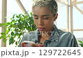 Black woman on smartphone, reading social media wifi communication and app message search. 5g internet network, girl focus online mobile contact and closeup of website digital technology connection 129722645