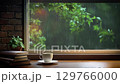 Rainy scenery seen from the cafe window, rain and raindrops flowing on the window, books and coffee on the table, and the relaxing sound of rain ASMR 129766000