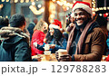 A positive homeless man sits at a table in a noisy homeless shelter cafeteria, surrounded by other people. Christmas concept. african american, black, animation, zoom in, eve 129788283