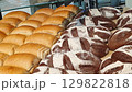 Footage of the various pastry and bread products in the bakery shop 129822818