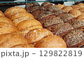 Footage of the various pastry and bread products in the bakery shop 129822819