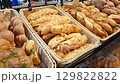 Footage of the various pastry and bread products in the bakery shop 129822822