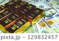 Paper us 100 dollar bill with gold bars, concept of investment and saving, wealth 129832457
