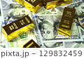 Paper us 100 dollar bill with gold bars, concept of investment and saving, wealth 129832459