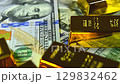 Paper us 100 dollar bill with gold bars, concept of investment and saving, wealth 129832462