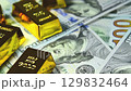 Paper us 100 dollar bill with gold bars, concept of investment and saving, wealth 129832464
