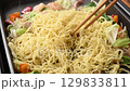 Salt-fried noodles on a hot plate 129833811