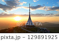 Enjoy breathtaking sunset views from Jested Mountain, featuring the iconic hotel and TV transmitter. Experience the natural beauty of Liberec in Czechia from above. Time-lapse footage 129891925