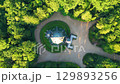 Discover the historical Schwarzenberg tomb located in Domanin, surrounded by lush forests. Experience the serene beauty and architectural details of this unique site. 129893256