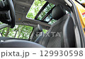4K Video Of The Two-Piece Panoramic Sunroof Tilts And Closes Electrically View From Driver Seat 129930598