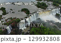 Majestic Iguazu Falls cascading in captured from above during the rainy season 129932808