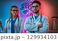 Clinic, healthcare professionals explore neuroscience brain glowing hologram and technology to enhance patient outcomes, illustrated by a detailed visual of the brains intricate structure 129934103
