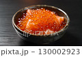 Vivid footage of salmon roe marinated in soy sauce served in a bowl 130002923