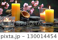 Atmospheric Zen Garden Scene with Water, Stones and Candles 130014454