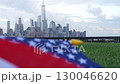 New York City waterfront skyline, Manhattan Downtown World Trade Center cityscape. American USA flag 130046620