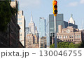New York City street crossroad, yellow traffic light, transport road intersection, United States. 130046755