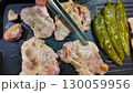 Pork grilled on coals korean style 130059956
