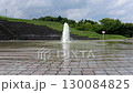 A fountain where water gushes out and spreads across the ground at Sapporo Asahiyama Memorial Park 130084825