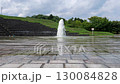 A fountain where water gushes out and spreads across the ground at Sapporo Asahiyama Memorial Park 130084828