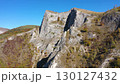 Flying over limestone cliffs and autumn forest aerial view 130127432