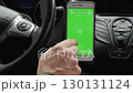 Smartphone with green screen in car interior 130131124