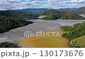 Patterns of acid mine drainage in decanting lake, nature pollution, aerial view 130173676
