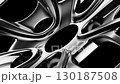A Dramatic Close-up of a Rotating Wheel Rim 130187508
