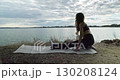 Engaging in Yoga by the Water Embrace Serenity and Improve Flexibility in the Beauty of Nature 130208124