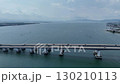 Drone aerial photography: Many cars passing over Lake Biwa Bridge under the summer sky 130210113