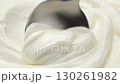 Sour cream and spoon, close up, 4K video 130261982
