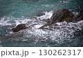 Waves crashing against the rock 130262317