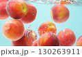 Juicy Peach Drop in Water with Splash and Bubbles 130263911