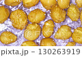 Whole Organic Raw Potatoes In Water Top View, Splash And Ripples. Slow Motion 130263919